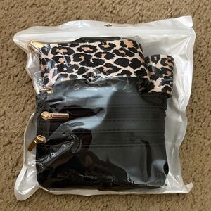 NWT Wristlet with shoulder strap attachment